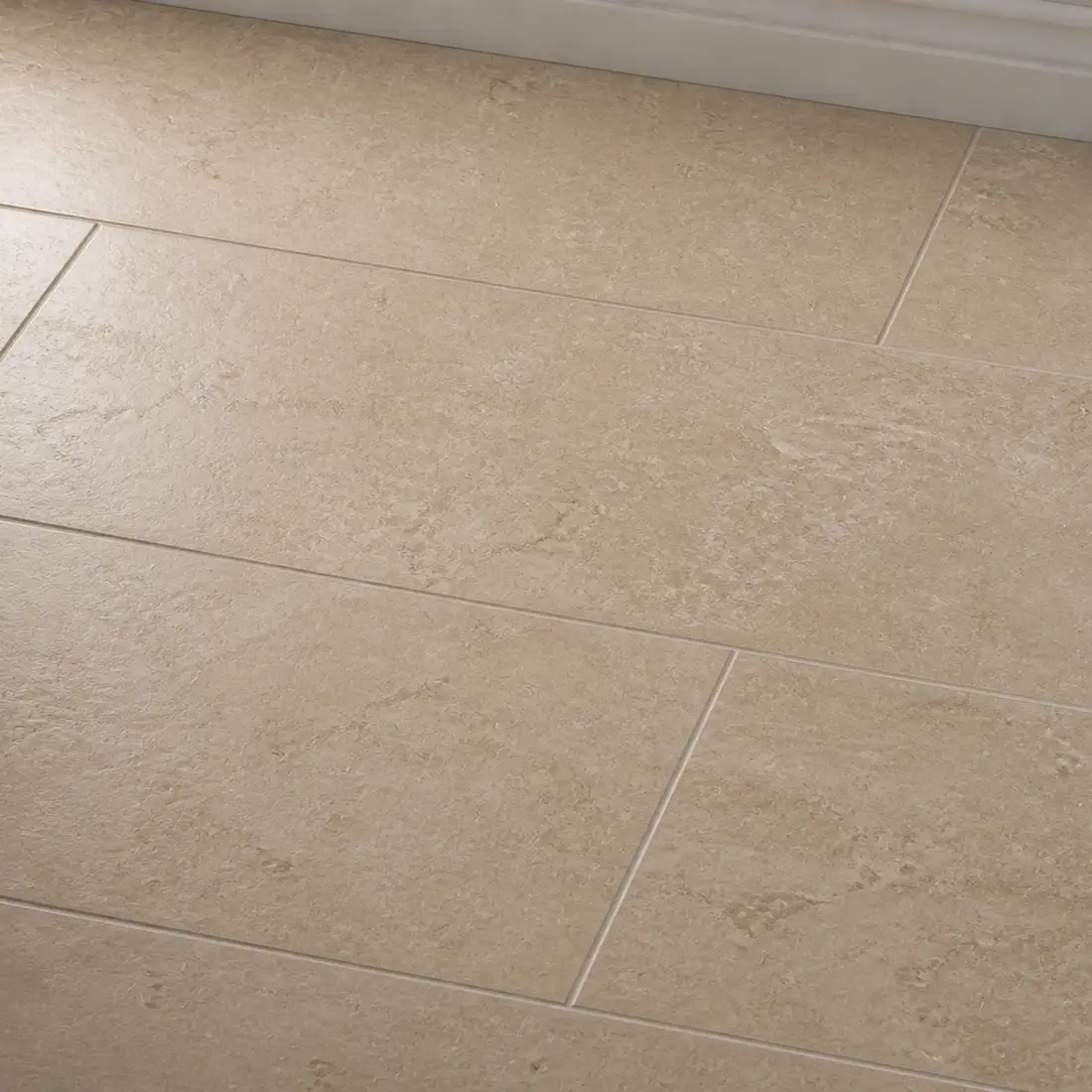 Tile & stone in raking light, close up